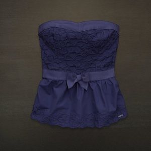 Blue strapless peplum